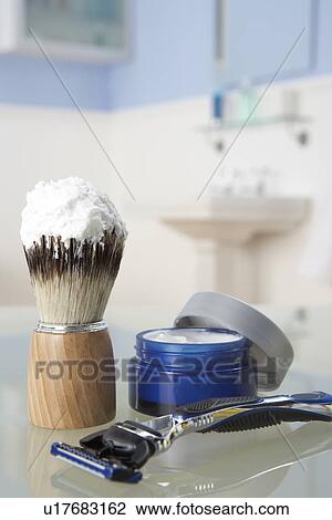 Stock Image - Man's shaving kit in bathroom. Fotosearch