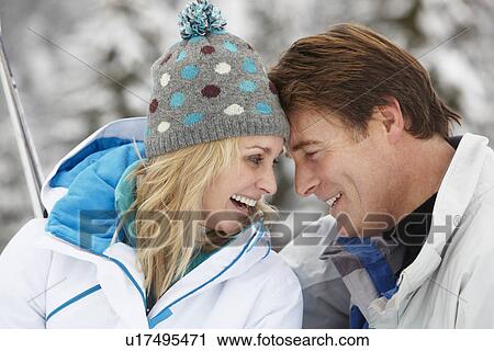 Middle Aged Couple On Ski Holiday In Mountains View Large Photo Image Stock Image - Middle Aged Couple On Ski Holiday In Mountains. Fotosearch