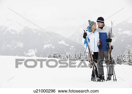 Middle Aged Couple On Ski Holiday In Mountains View Large Photo Image Stock Photograph - Middle Aged Couple On Ski Holiday In Mountains. Fotosearch
