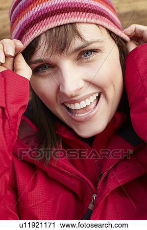 Stock Image - Middle Aged Woman Dressed For Cold Weather. Fotosearch