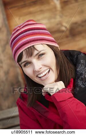 Stock Image - Middle Aged Woman Dressed For Cold Weather. Fotosearch