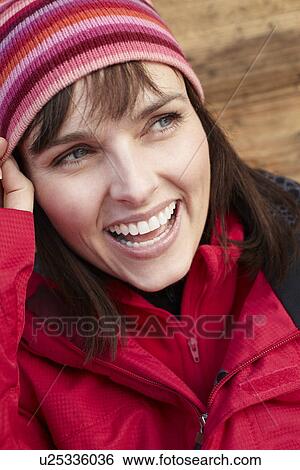 Stock Photograph - Middle Aged Woman Dressed For Cold Weather. Fotosearch
