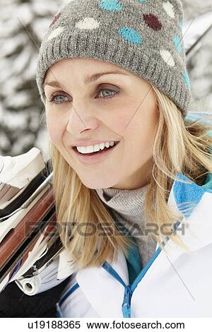 Middle Aged Woman On Ski Holiday In Mountains View Large Photo Image Stock Photography - Middle Aged Woman On Ski Holiday In Mountains. Fotosearch