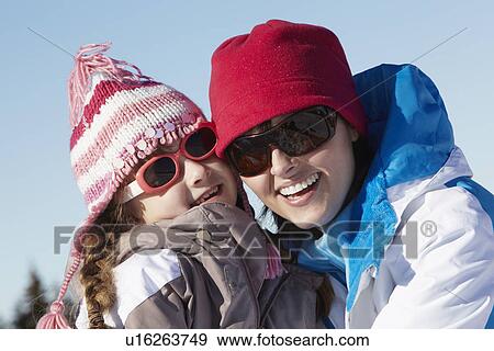 Mother And Daughter Having Fun On Ski Holiday In Mountains View Large Photo Image Stock Photo - Mother And Daughter Having Fun On Ski Holiday In Mountains. Fotosearch