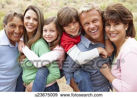 Stock Photo - Multi generation family outdoors. Fotosearch