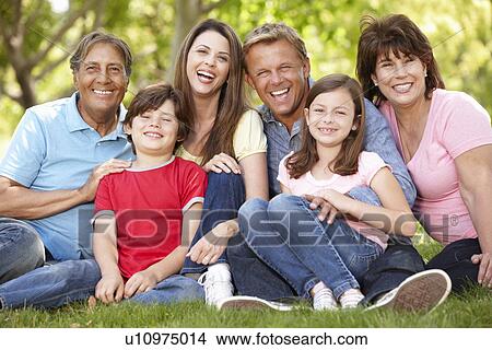 Picture - Multi generation Hispanic family in park. Fotosearch