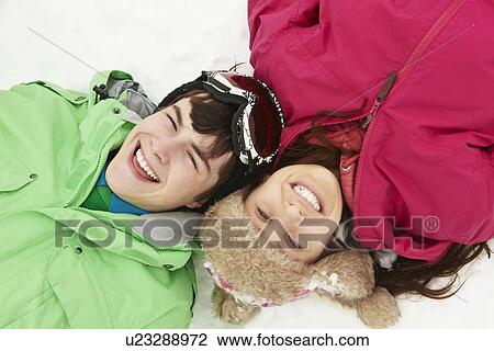 Overhead View Of Two Teenagers On Ski Holiday In Mountains View Large Photo Image Stock Image - Overhead View Of Two Teenagers On Ski Holiday In Mountains. Fotosearch