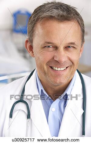 Stock Photo - Portrait American doctor on hospital ward. Fotosearch