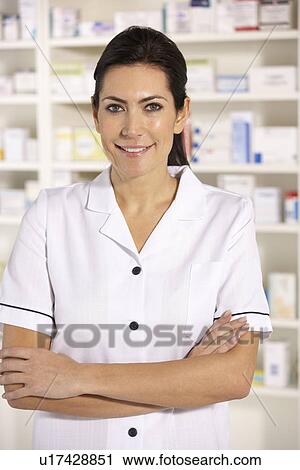 Stock Image - Portrait American pharmacist at work. Fotosearch