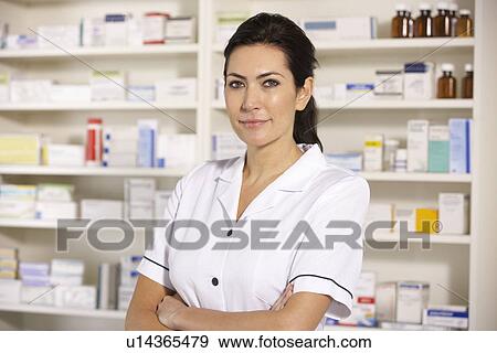 Stock Photo - Portrait American pharmacist at work. Fotosearch