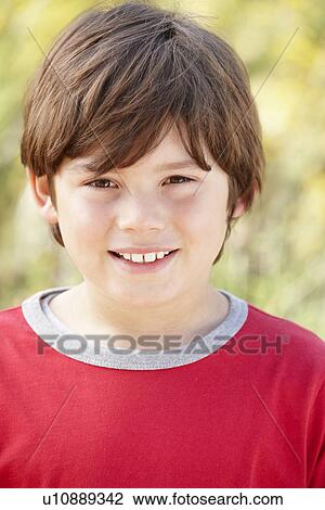 Portrait caucasian boy outdoors View Large Photo Image Stock Image - Portrait caucasian boy outdoors. Fotosearch