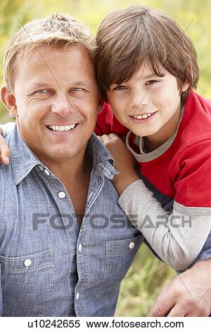 Portrait father and son outdoors View Large Photo Image Stock Photography - Portrait father and son outdoors. Fotosearch