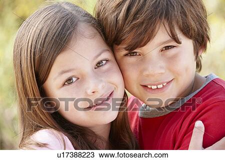 Portrait hispanic brother and sister outdoors View Large Photo Image Stock Image - Portrait hispanic brother and sister outdoors. Fotosearch