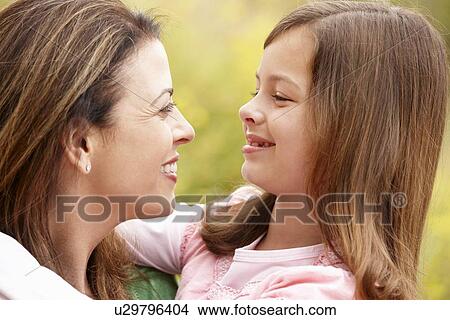 Picture - Portrait Hispanic mother and daughter. Fotosearch