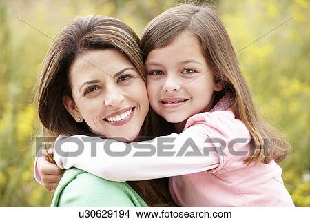 Picture - Portrait Hispanic mother and daughter. Fotosearch
