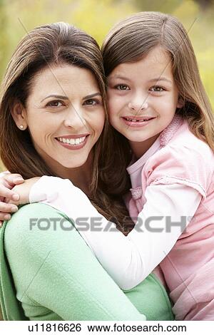 Portrait Hispanic mother and daughter View Large Photo Image Stock Photograph - Portrait Hispanic mother and daughter. Fotosearch
