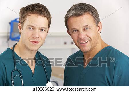 Stock Image - Portrait medical staff on hospital ward. Fotosearch