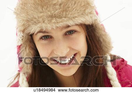 Picture - Portrait Of Teenage Girl In Snow Wearing Fur Hat. Fotosearch