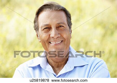 Stock Photo - Portrait senior Hispanic man outdoors. Fotosearch