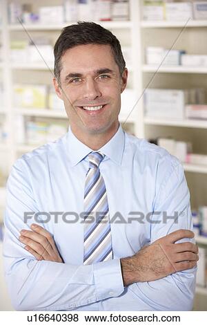 Portrait UK pharmacist at work View Large Photo Image Stock Photo - Portrait UK pharmacist at work. Fotosearch