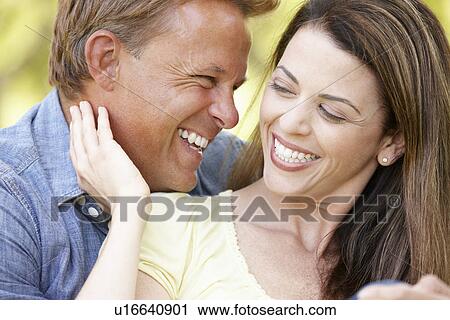 Stock Image - Romantic couple outdoors. Fotosearch