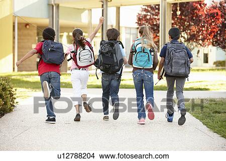 Schoolchildren at home time View Large Photo Image Picture - Schoolchildren at home time. Fotosearch