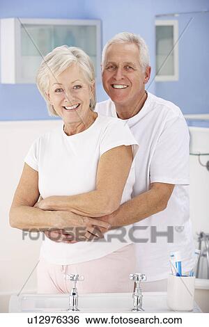 Senior couple hugging in bathroom View Large Photo Image Stock Photograph - Senior couple hugging in bathroom. Fotosearch
