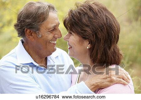 Picture - Senior Hispanic couple outdoors. Fotosearch