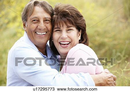 Stock Image - Senior Hispanic couple outdoors. Fotosearch