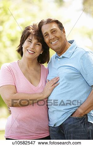 Stock Photo - Senior Hispanic couple outdoors. Fotosearch