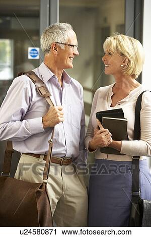 Stock Image - Senior students in college. Fotosearch