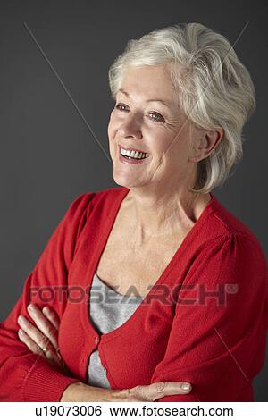 Stock Photograph - Senior woman studio portrait. Fotosearch