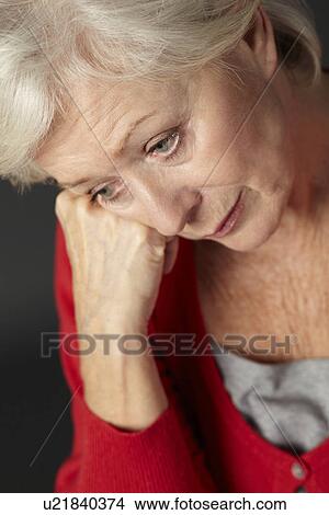 Senior woman suffering from depression View Large Photo Image Picture - Senior woman suffering from depression. Fotosearch