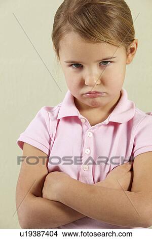 Picture - Studio Shot Of Angry Young Girl. Fotosearch
