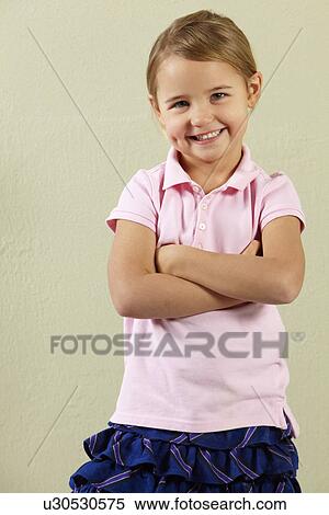 Studio Shot Of Happy Young Girl View Large Photo Image Stock Photography - Studio Shot Of Happy Young Girl. Fotosearch