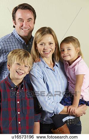 Studio Shot Of Relaxed Family View Large Photo Image Stock Photograph - Studio Shot Of Relaxed Family. Fotosearch