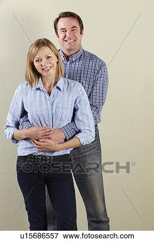 Studio Shot Of Relaxed Middle Aged Couple View Large Photo Image Stock Photo - Studio Shot Of Relaxed Middle Aged Couple. Fotosearch