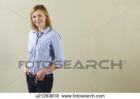 Stock Photo - Studio Shot Of Relaxed Middle Aged Woman. Fotosearch