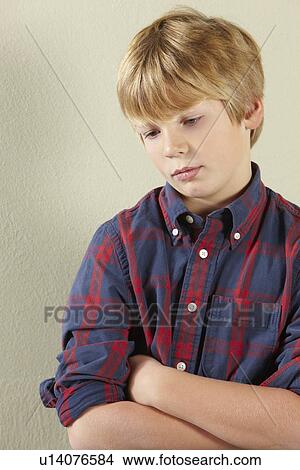 Studio Shot Of Thoughtful Young Boy View Large Photo Image Picture - Studio Shot Of Thoughtful Young Boy. Fotosearch