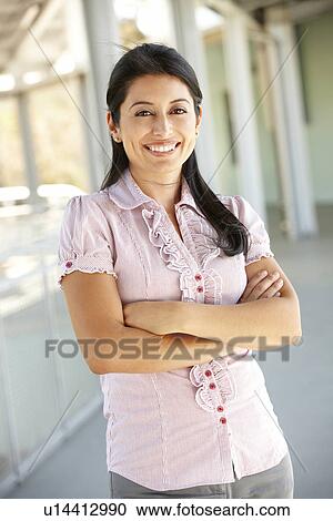 Teacher standing outside school building View Large Photo Image Stock Image - Teacher standing outside school building. Fotosearch