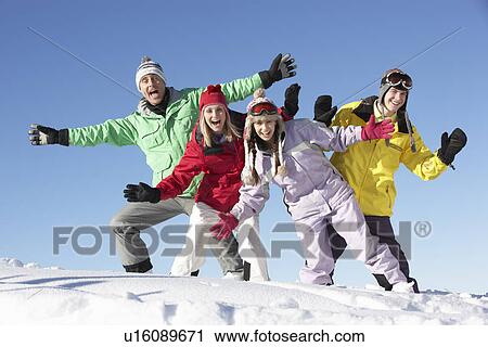 Teenage Family On Ski Holiday In Mountains View Large Photo Image Stock Image - Teenage Family On Ski Holiday In Mountains. Fotosearch