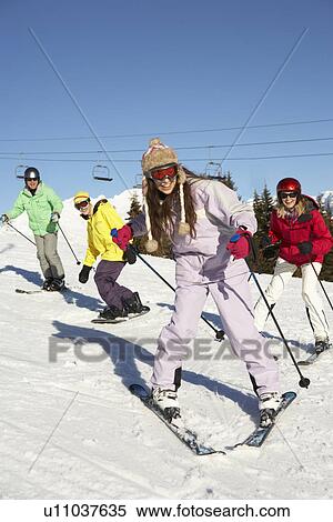 Teenage Family On Ski Holiday In Mountains View Large Photo Image Stock Photography - Teenage Family On Ski Holiday In Mountains. Fotosearch