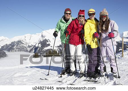 Teenage Family On Ski Holiday In Mountains View Large Photo Image Stock Photography - Teenage Family On Ski Holiday In Mountains. Fotosearch