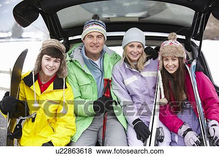 Teenage Family Sitting In Boot Of Car With Skis View Large Photo Image Stock Photo - Teenage Family Sitting In Boot Of Car With Skis. Fotosearch