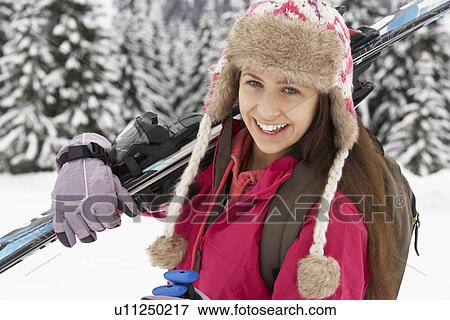Teenage Girl On Ski Holiday In Mountains View Large Photo Image Stock Photo - Teenage Girl On Ski Holiday In Mountains. Fotosearch