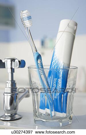 Stock Photo - Toothbrush and toothpaste. Fotosearch