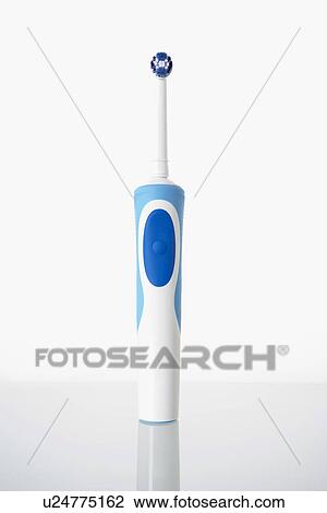 Toothbrush standing on glass shelf View Large Photo Image Stock Image - Toothbrush standing on glass shelf. Fotosearch