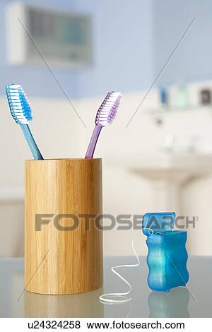 Toothbrushes and dental floss View Large Photo Image Stock Photo - Toothbrushes and dental floss. Fotosearch