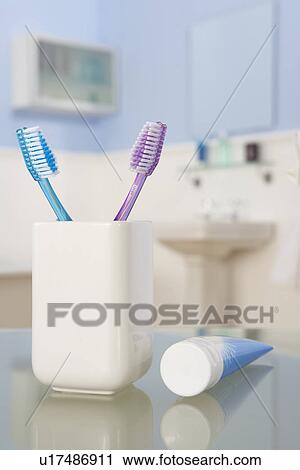 Stock Image - Toothbrushes and toothpaste. Fotosearch