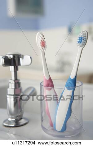 Toothbrushes in bathroom View Large Photo Image Picture - Toothbrushes in bathroom. Fotosearch